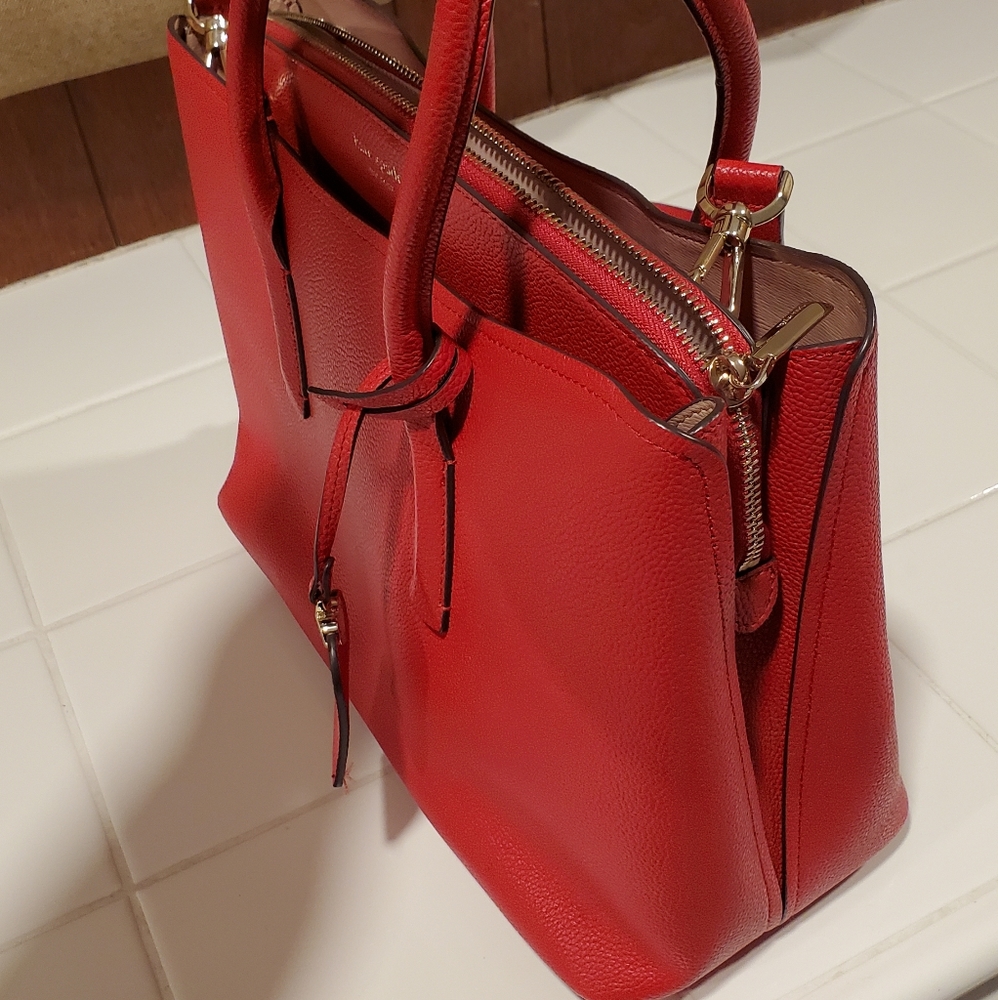 Kate Spade crossbody red tote. 3 compartments with center zip. Excellent cond.